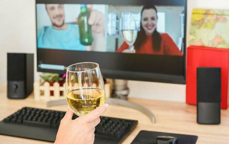 Cheers with friends via video conferencing