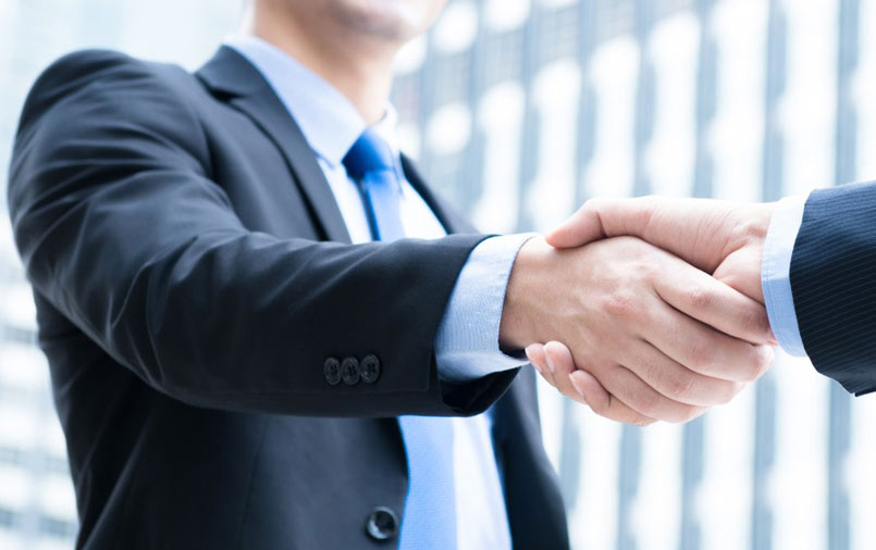 handshake after a locked deal