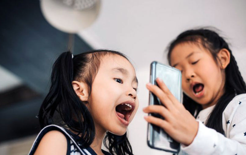 Kids using a phone