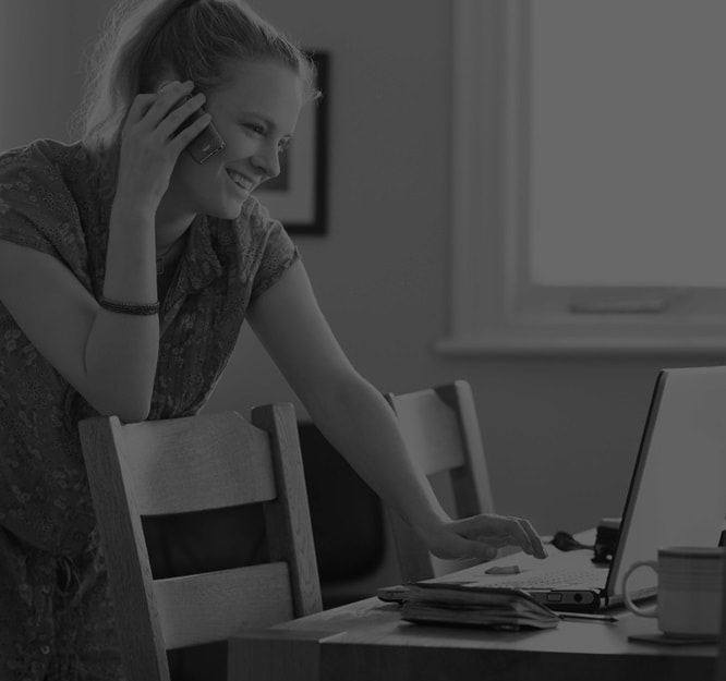 Girl on phone and computer