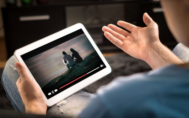 Man Holding Tablet