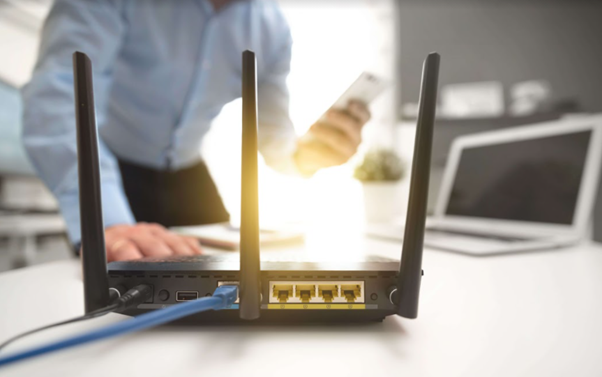 Man In Front Of Modem
