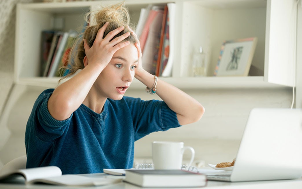 Woman stressed out at NBN Outages